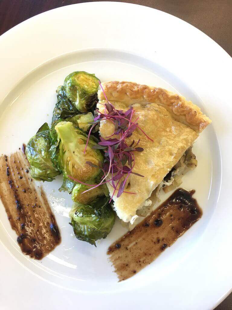 Aubergines and Leeks Pie with Almonds Spread, Brussels Sprouts, and Crunchy Shallots in a Black Garlic Sauce (vegan) 2