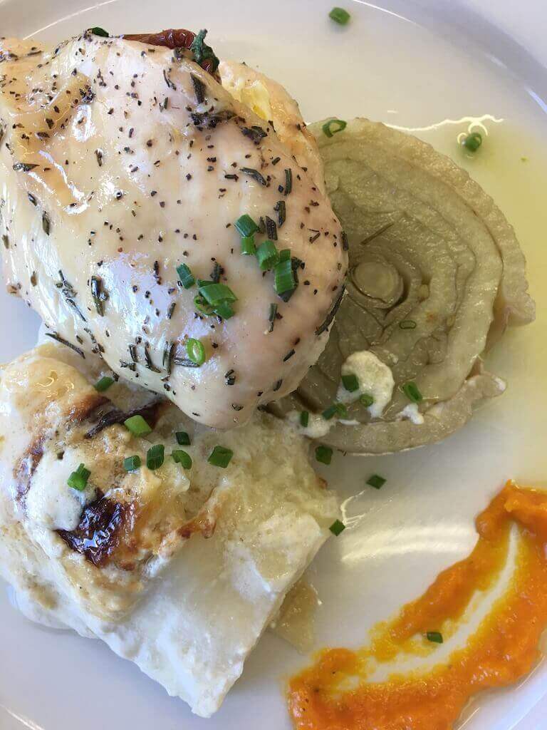 Chicken Breast Stuffed with Spinach, Dried Tomatoes and Catupiry Cheese, served with Confit Fennel, Potato Terrine and Aji Sauce