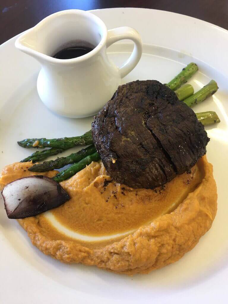 Herbal Beef Filet, Sweet Potatoes, Grilled Asparagus and Shallots in a Merlot Sauce